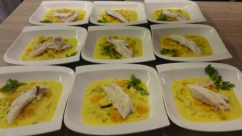 Fish fillet on turmeric white wine vegetables
