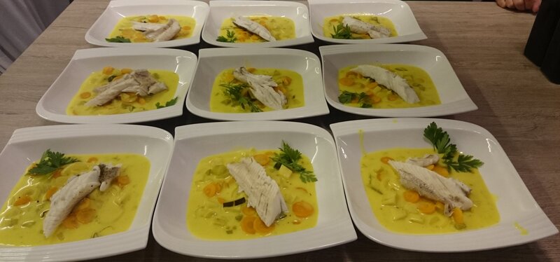 Fish fillet on turmeric white wine vegetables