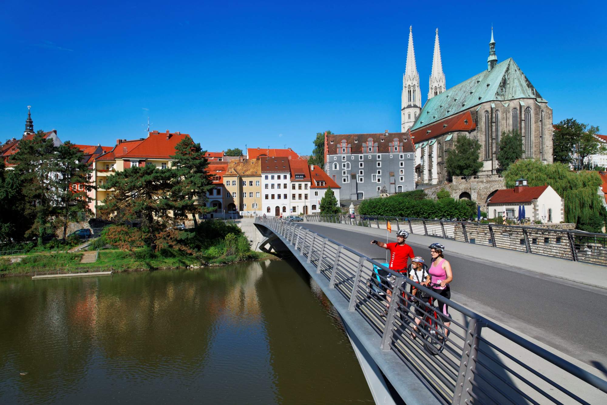 Starý městský most Peterskirche Cyklista